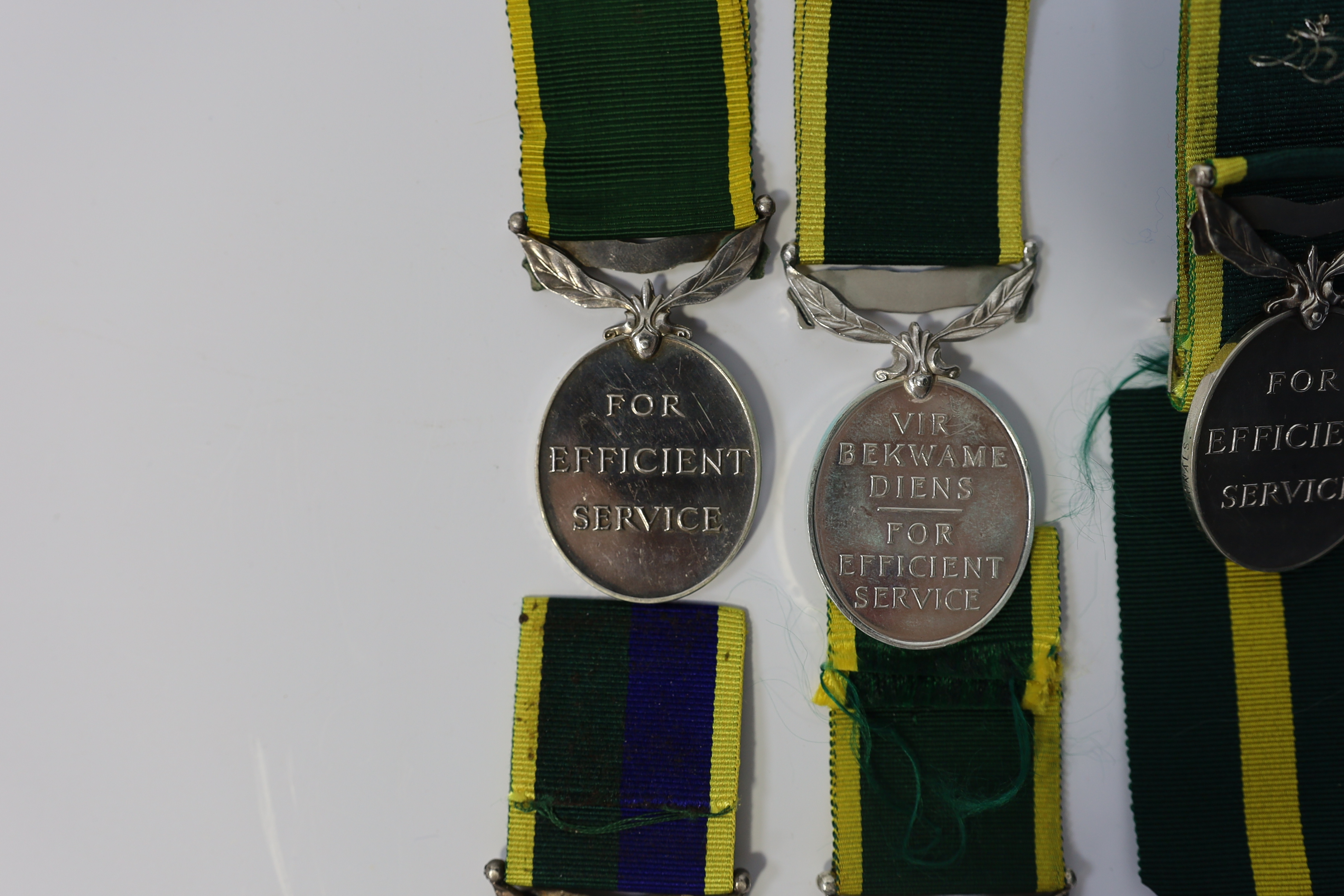 Six assorted Efficiency medals; GV (C) India to Pte.F.S.Slee,1 E.I.RY.R.,A.F.I.;GV (A) Territorial to 477046 Sjt H.W.Pawley, R.A.M.C.; GVI Militia to 2313197 Sclmn.S.H.Dummer, R.Signals.; GVI Territorial to 1434970 Gnr C